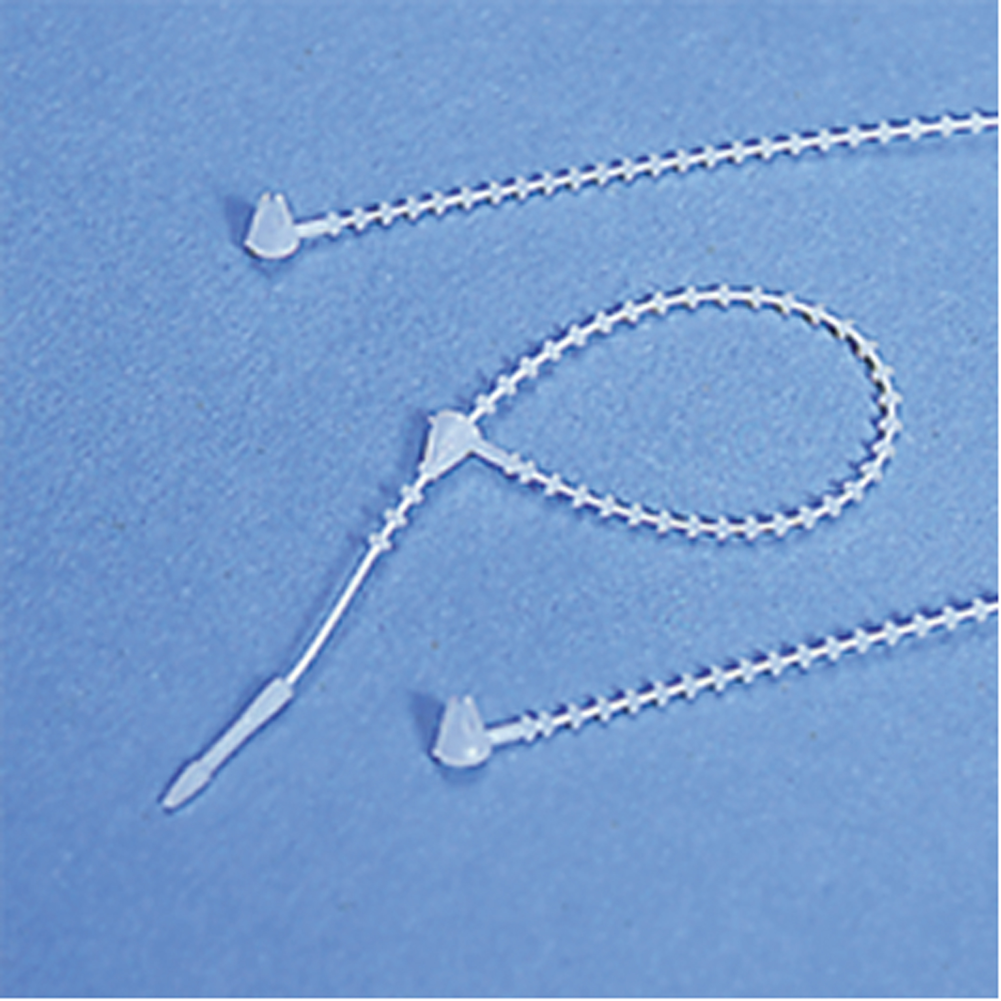 Options de finition pour étiquettes - attaches en billes de nylon